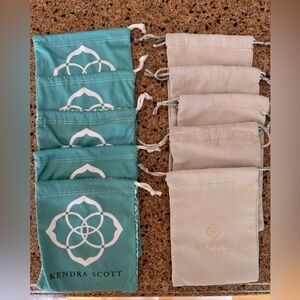 10 Kendra Scott Jewelry Bags: 5 blue (original
style), 5 neutral (current style)